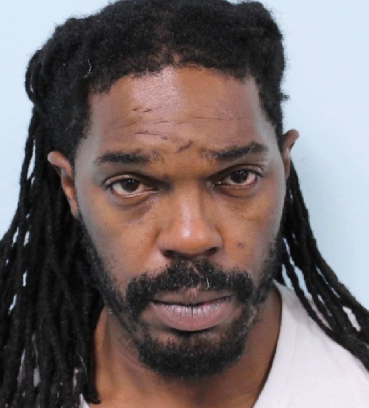 Titus Crews of Springfield (pictured here) is accused of strangling a woman in an effort to steal her purse.