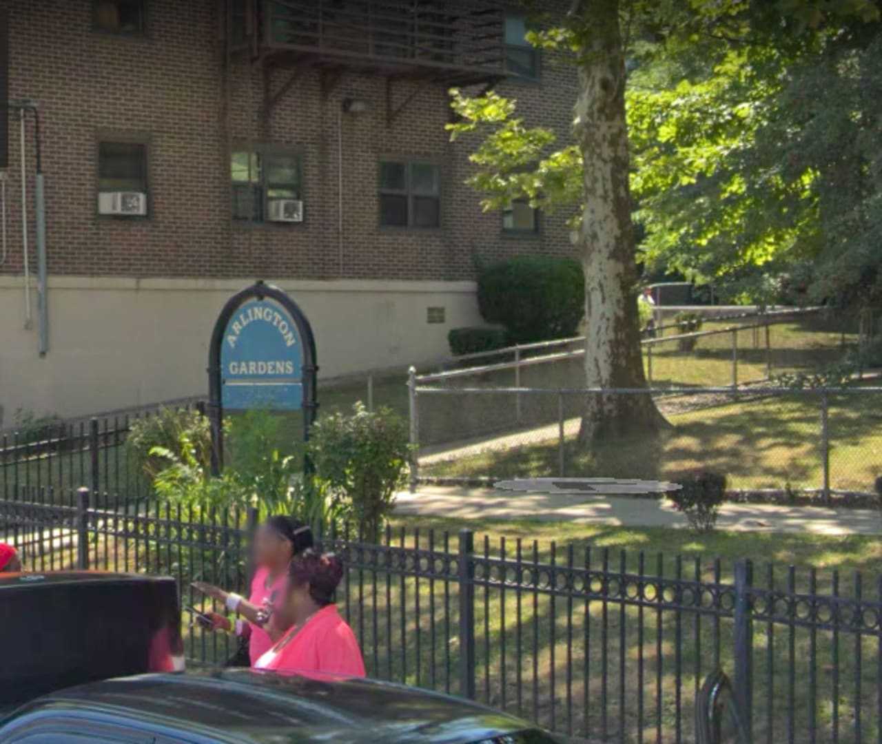 Two men suffered non-life-threatening injuries after they were shot by police near this Jersey City housing complex.