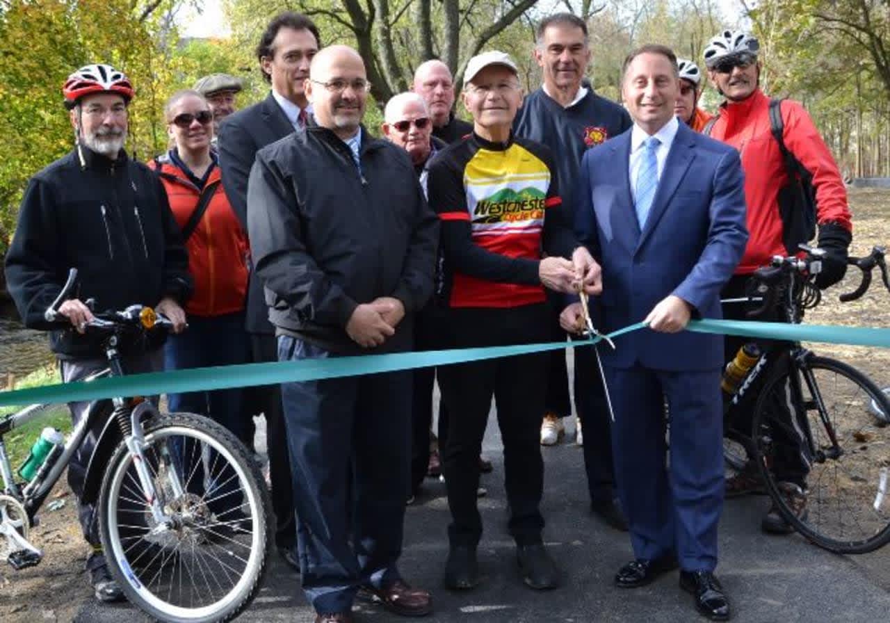 Rob Astorino and cyclists help open the final stretch of the South County Trailway