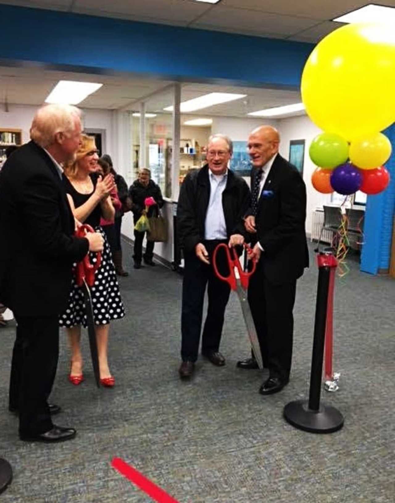Mayor Ron Belmont, right, helped celebrate the West Harrison Library's grand reopening this Monday.
