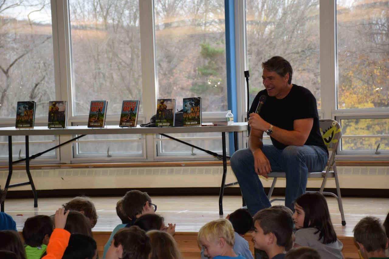 Former NFL player and sports author Tim Green offered students advice for learning to love reading and becoming kind and encouraging people.