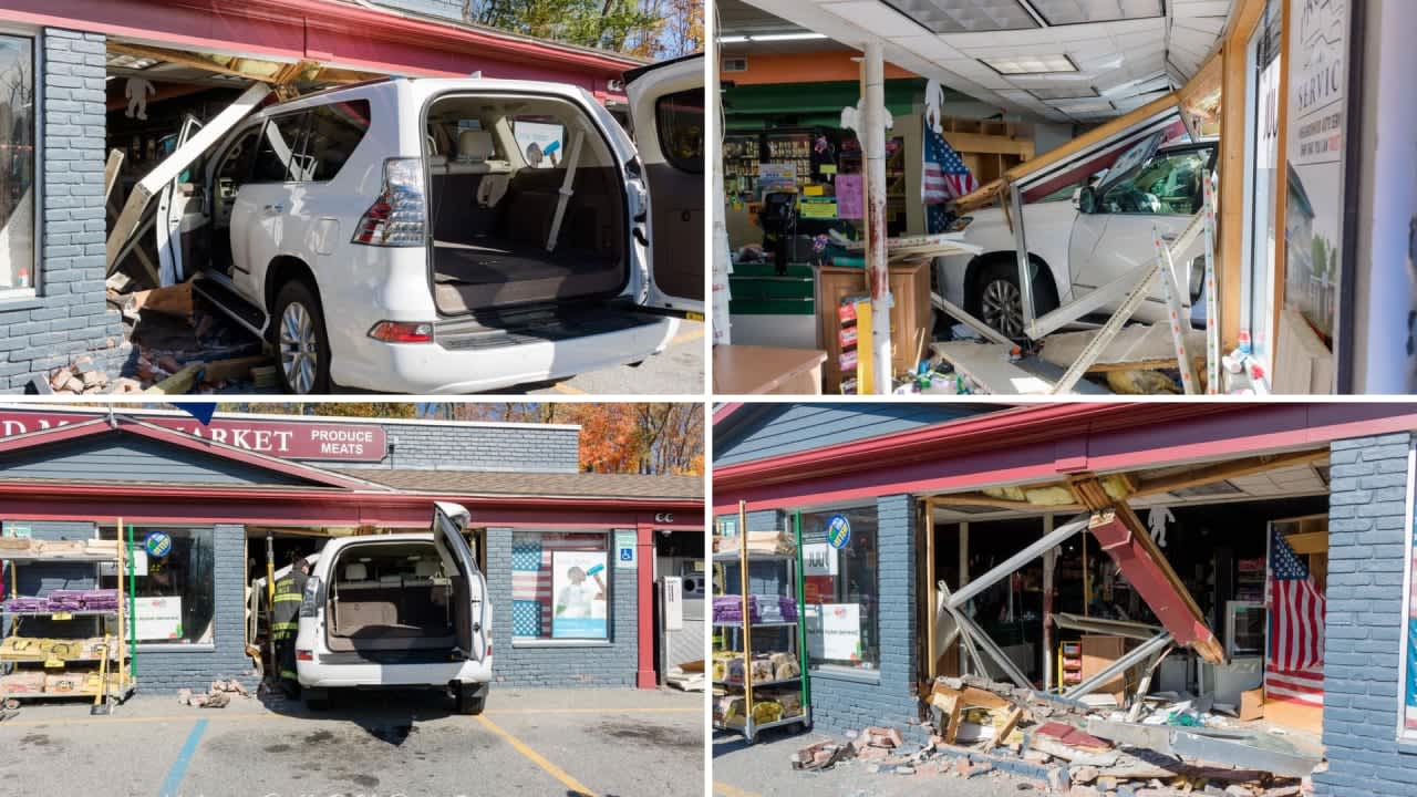 A car crashed into the Red Mills Market in Mahopac Falls, injuring the driver and a person who was pinned inside.