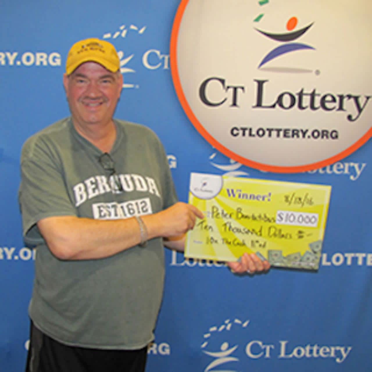 Peter Bonitatibus Jr. of Monroe with his $10,000 lottery prize.