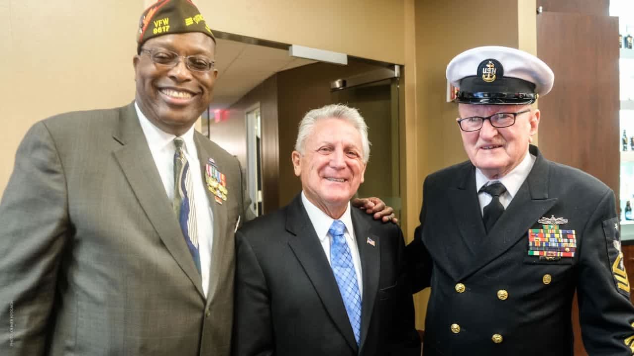 Don Burrows, right, served for more than four decades in the U.S. Navy. He is shown with Archie Elam of Stamford, left, and Norwalk Mayor Harry Rilling.