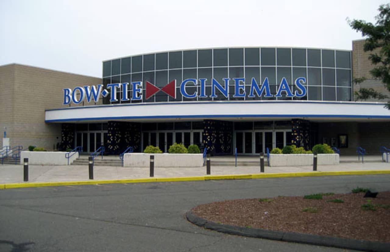 A Norwalk man was arrested after he beat his girlfriend in the parking lot of the Bow Tie Cinema in Trumbull.