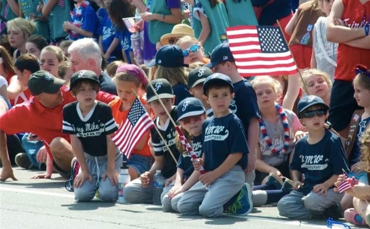 Little Leaguers watch the Memorial Day parade in Fairfield last year.
