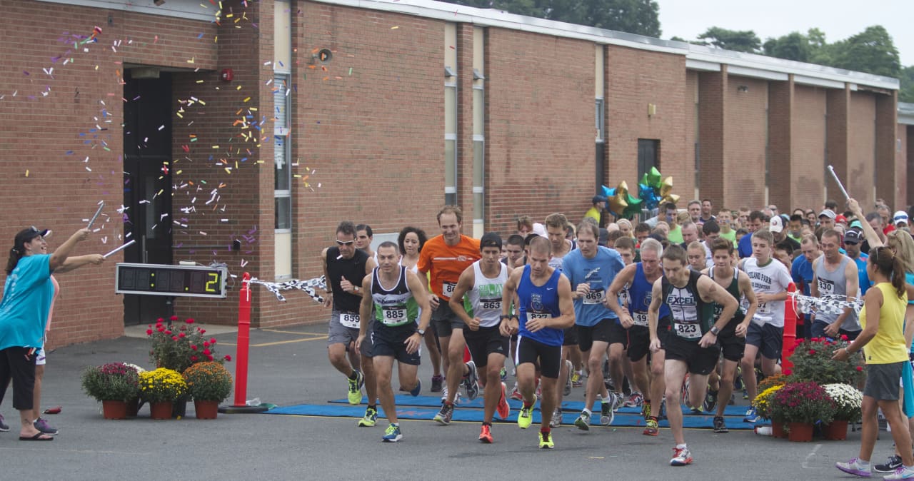 Runners take off at the starting line during last year's Midland Park 5K run.