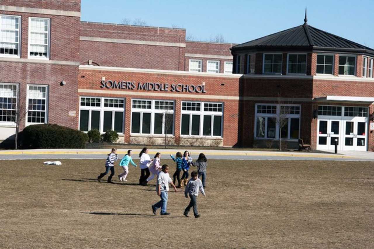 Somers Middle School, pictured, is among those whose classes were canceled on Monday due to a vandalism affecting nearly half of the school-bus fleet.