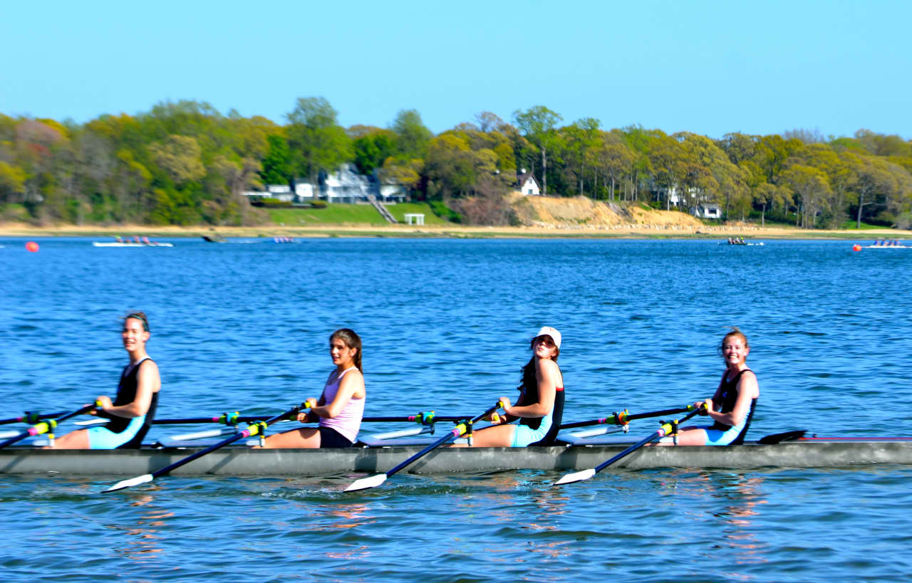 The team of (left to right) Cara Hoelzl, Mary Campbell, Claire Campbell, and Bea Tobey won a gold medal for New Canaan Crew at the Northeast Championships.