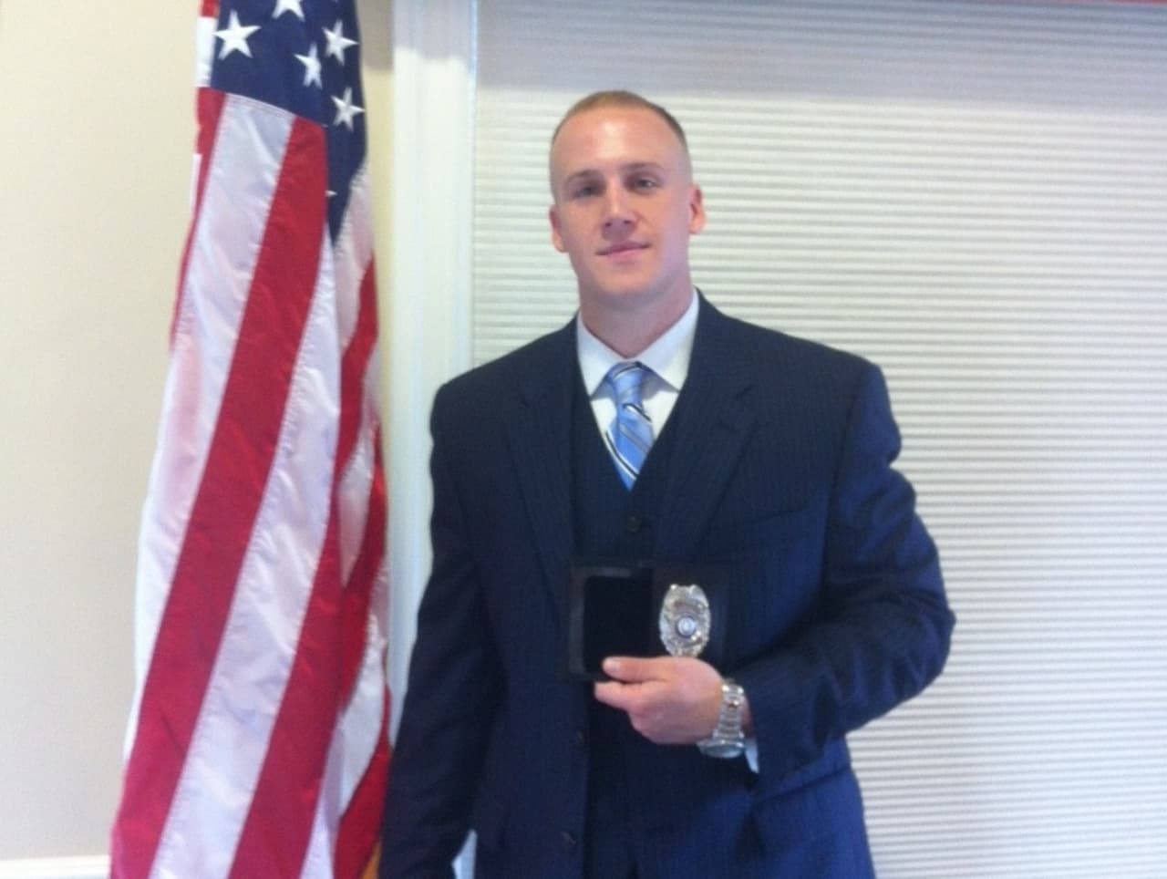 Thomas Callinan was sworn in as a probationary officer with New Canaan Police Department on Thursday. 