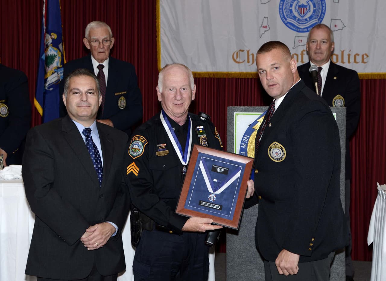 Sergeant Thomas Tunney (center) was awarded the 2013 New England Association of Chiefs of Police Medal of Valor in Plymouth, Mass. last month.