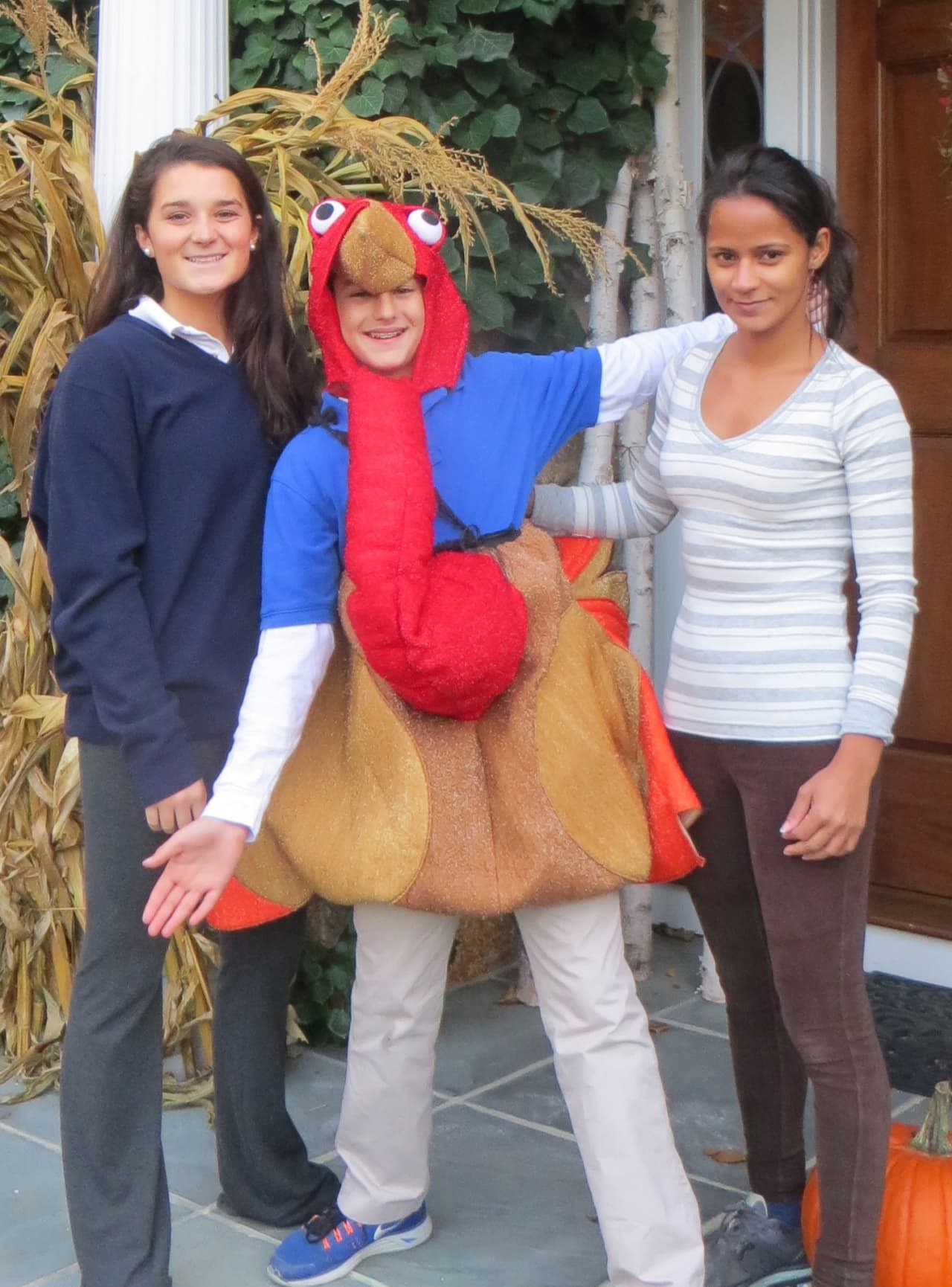 The 10th Annual Turkey Trot is Nov. 24 in New Canaan. From left are Kelly Clark, Teddy Schoenholtz and Ereide Silva