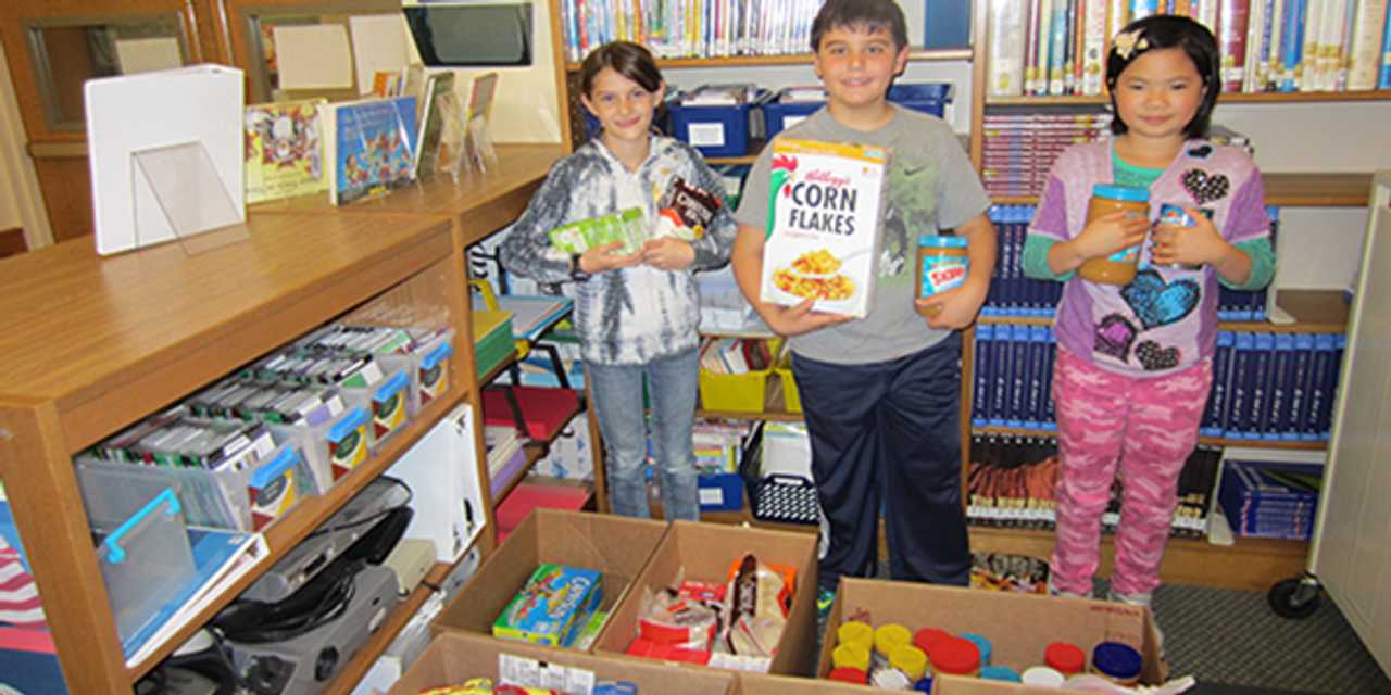 Students from Preston Elementary filled 10 large boxes of food items for the Harrison food pantry recently. 