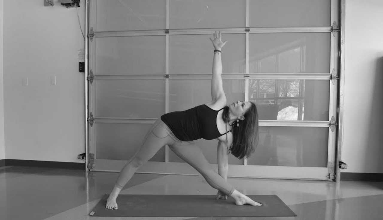 Sign up for Club Fit Briarcliff's power yoga classes to get an intermediate-level workout. 