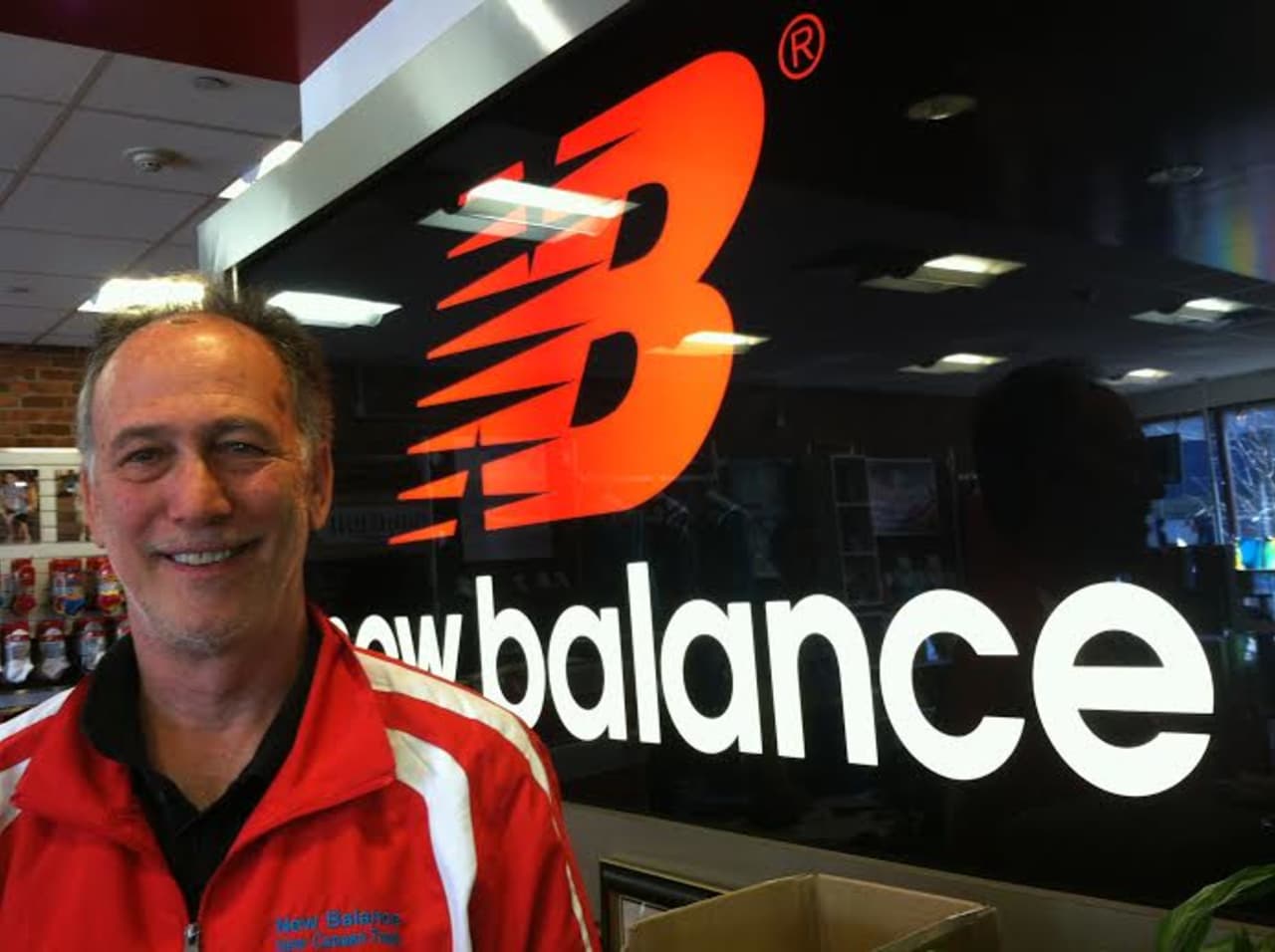 Ron Rosenfeld, owner of New Balance New Canaan, is happy a U.S. man won Boston Marathon.
