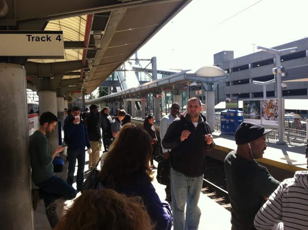 A crowd of commuters waits for a train at the Stamford Train Station last year.