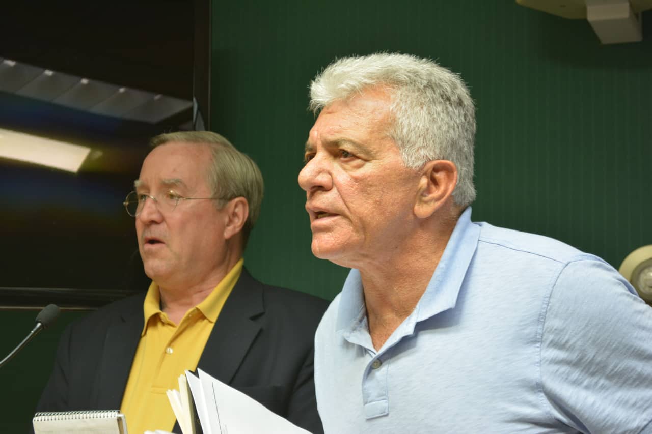 Armonk developer Michael Fareri, right, is reportedly changing his proposal for a development at an old lumberyard from a mix of 30 market-rate condos and six affordable units to a project with 48 affordable units.