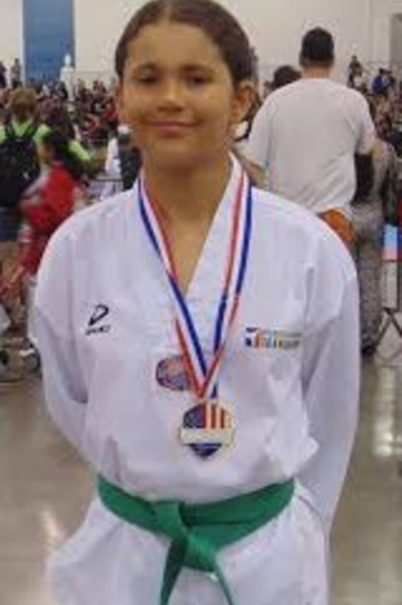 Emily Fields, 11, of Wilton won a gold medal recently at the Taekwondo National Championships in San Jose, Calif. 