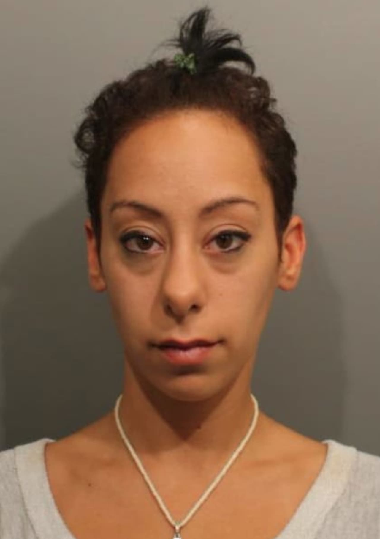 Angelica Pasakiolis, 27, of Wilton was arrested after slamming into a utility pole with her 3-year-old and 1-year-old children in the vehicle, Wilton Police said.