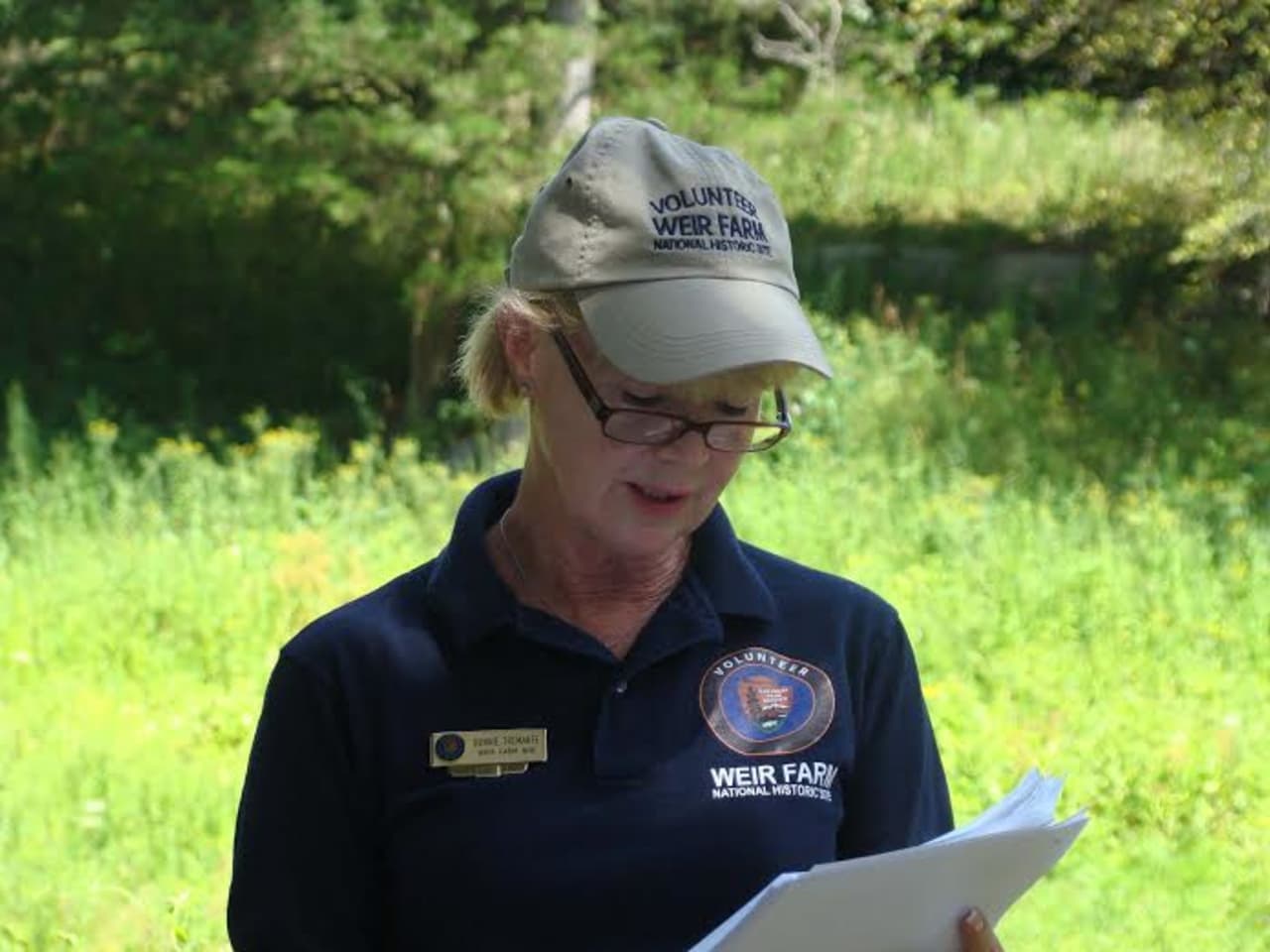 Volunteer Bonnie Tremante giving a tour at Weir Farm National Historic Site.