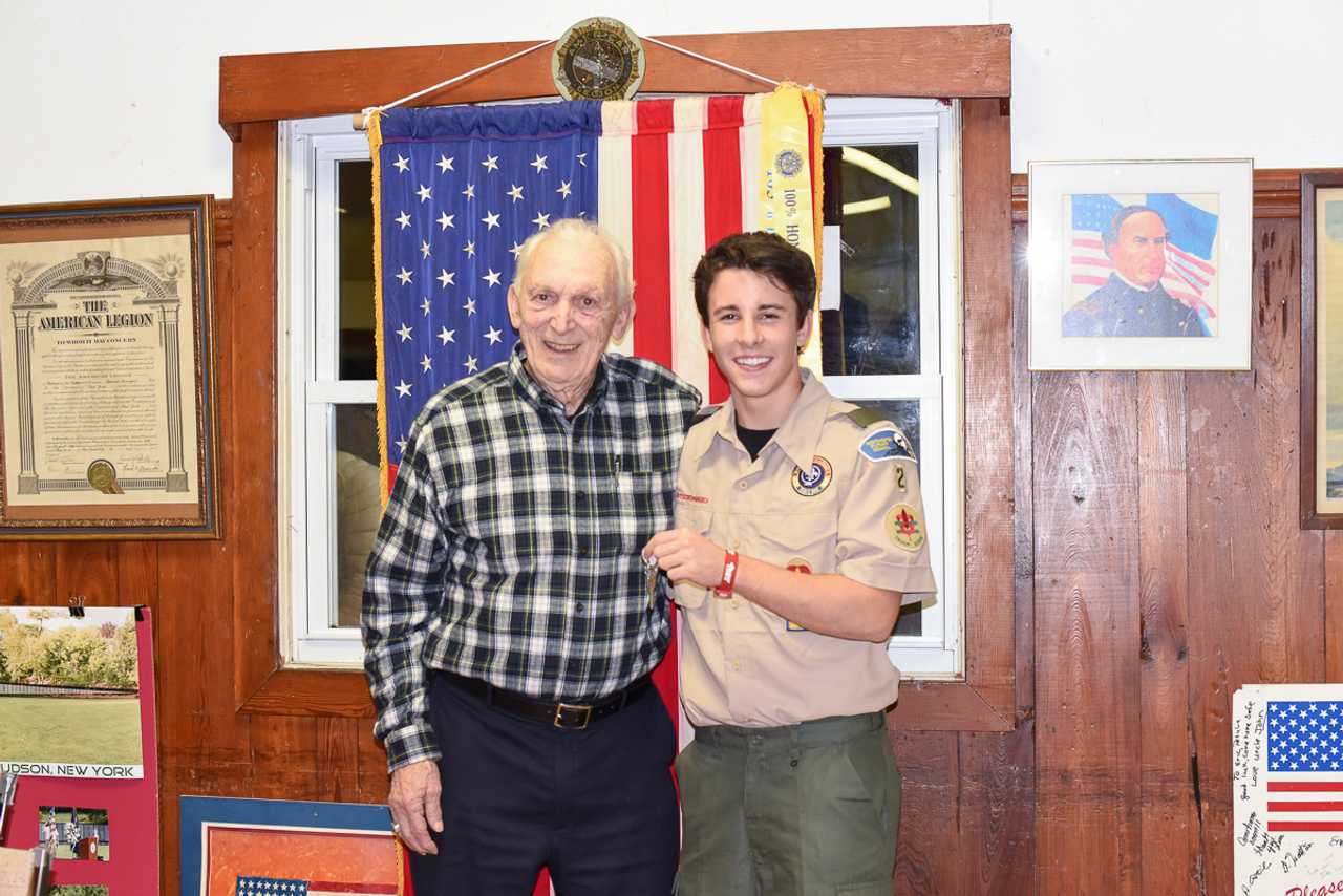 Zak Armacost (right) hands over the keys to Admiral Farragut Post 1195 to Post Commander James Pasanello