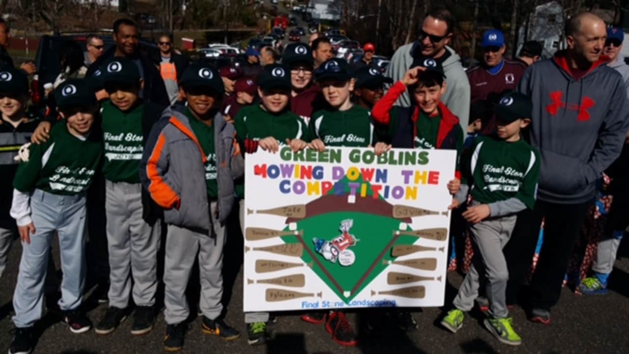 Future sluggers march in Ossining's Little League Parade.