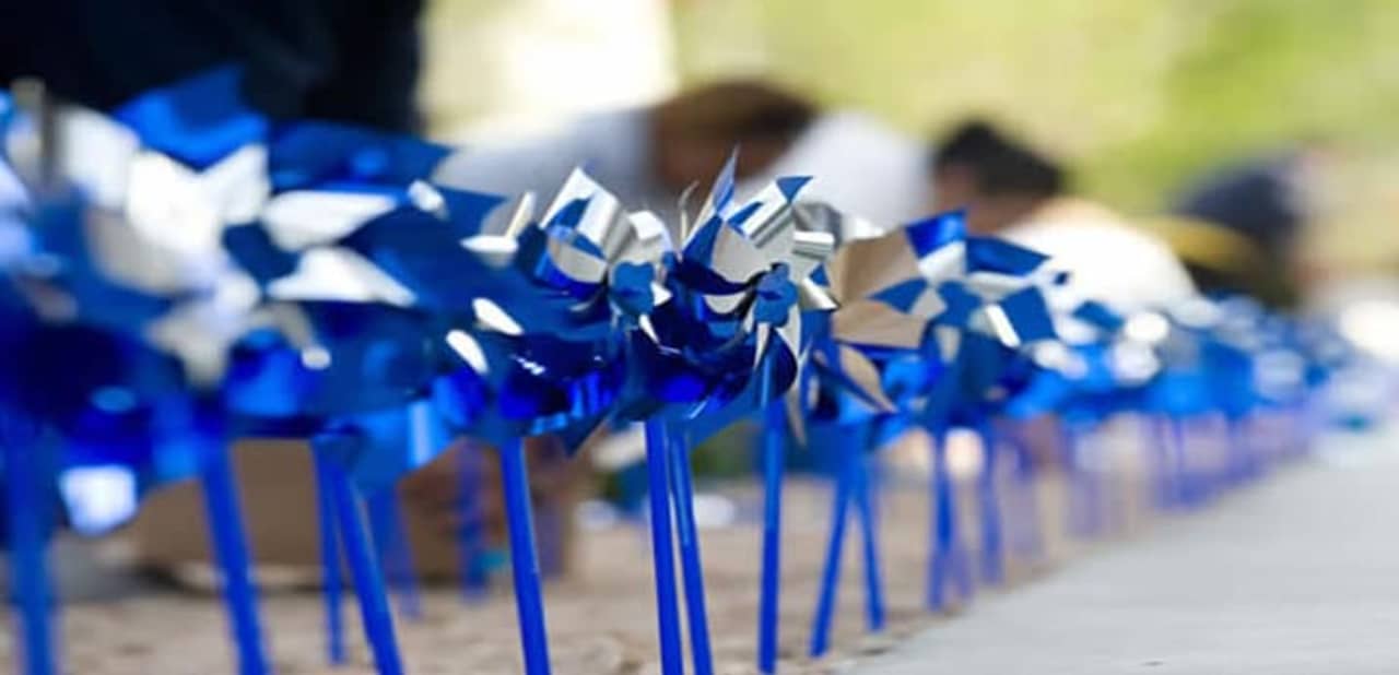About 50 Fairfield County students will plant over 1,800 pinwheels in New Canaan and Stamford on Sunday as part of a Child Abuse Prevention Month project.