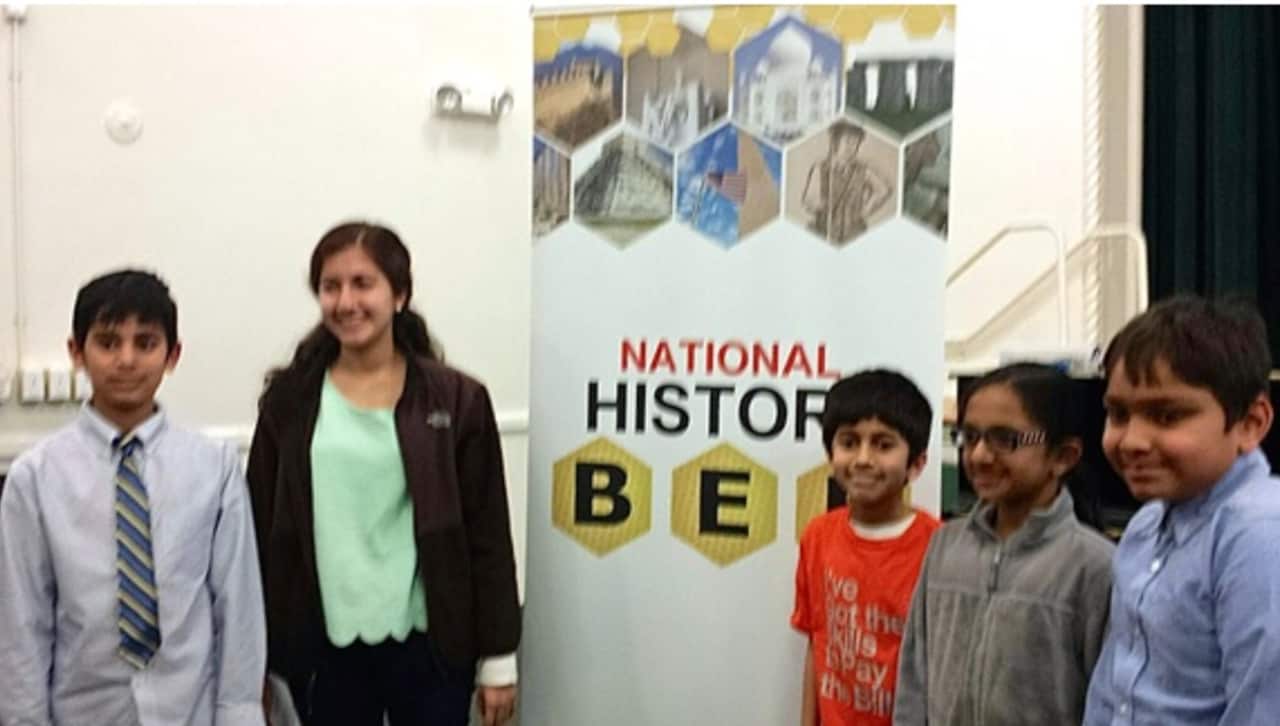 At the National History Bee regional finals on April 14 at Middlesex Middle School in Darien are, from left, Anjo Therattil, Esha Sharma (coach), Jay Sharma, Krithika Natarajan and Aalok Bhattacharya. 