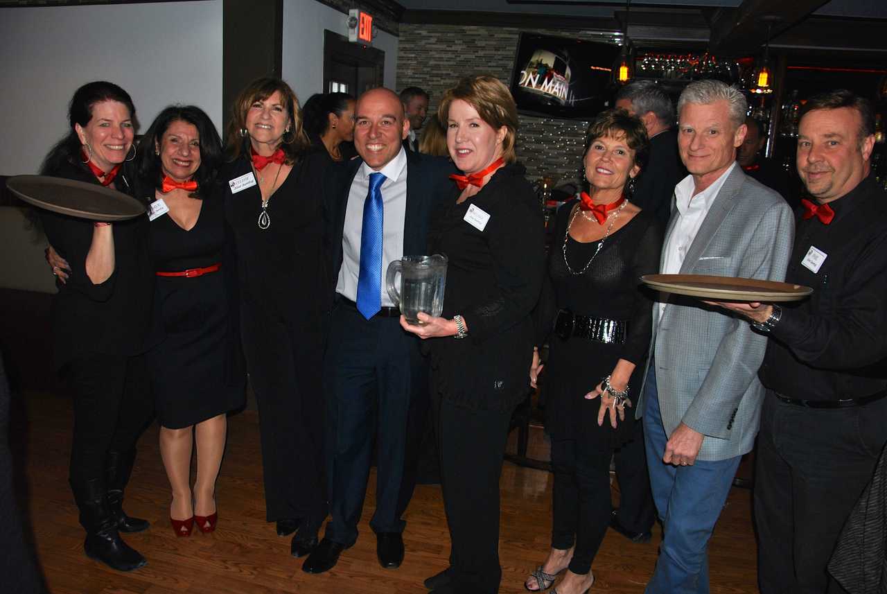 From left, Diane Butterman, Carol Christiansen, Celeste Boglioli, Lou Cardillo, Melissa Reilly, Susan Salomone, Steve Salomone and Phil Risi recently participated in a KW Now Serving charity event in Granite Springs.