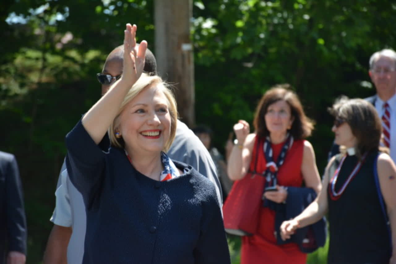 New book claims Hillary Clinton, shown marching in Chappaqua's Memorial Day Parade in May, had a face-lift.