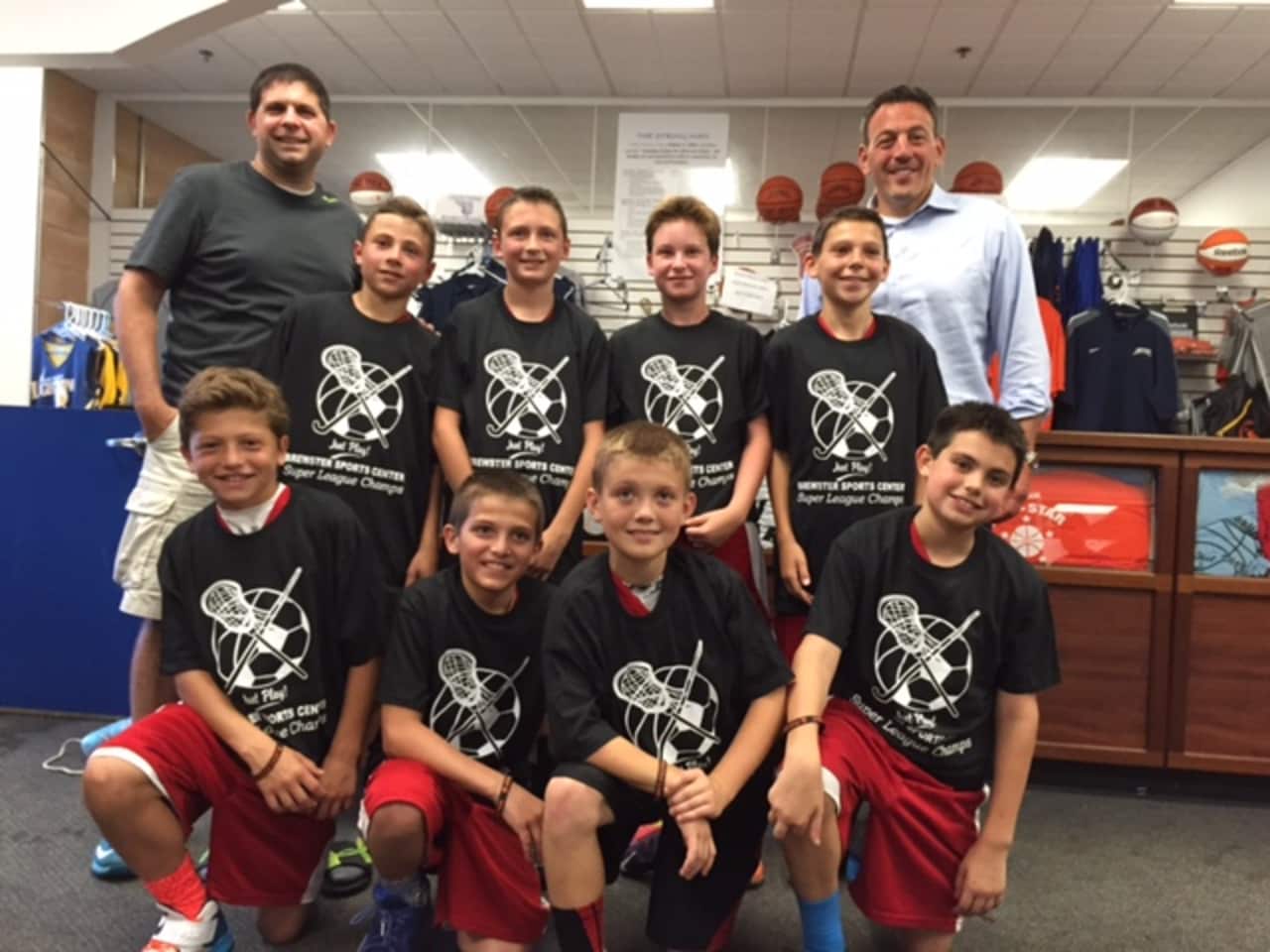Somers Fifth Grade Boys won the Brewster Super League A title. Bottom row from left Derek Marcus, Nicky Iocovello, T.J Olifiers, Nick Ferraro. Top row from left Bennett Leitner, Ryan Grant, Max Hechler, Jake Riina. CoachMike Ferraro, Kevin Marcus