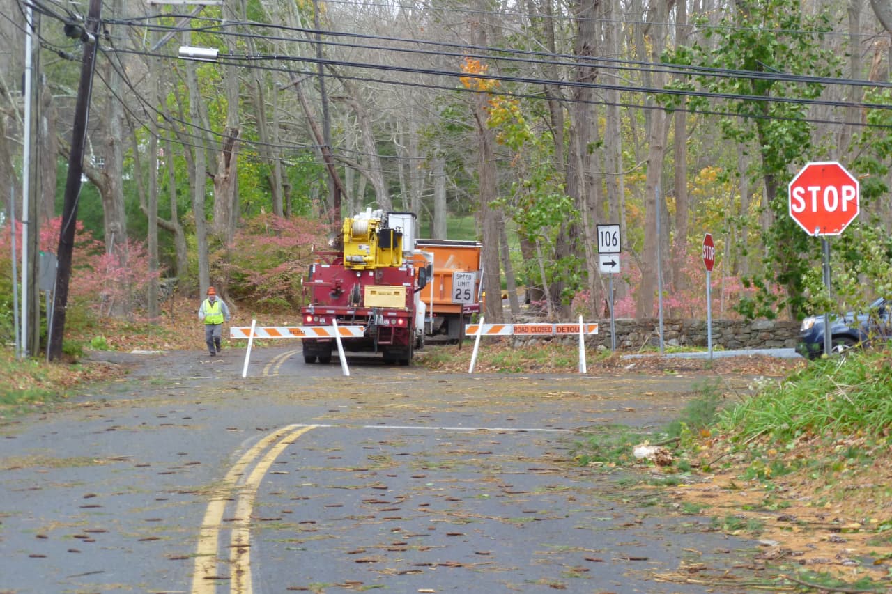 New Canaan officials say power restoration efforts won't start until Friday at the earliest while crews work to make roads safe for passage. 