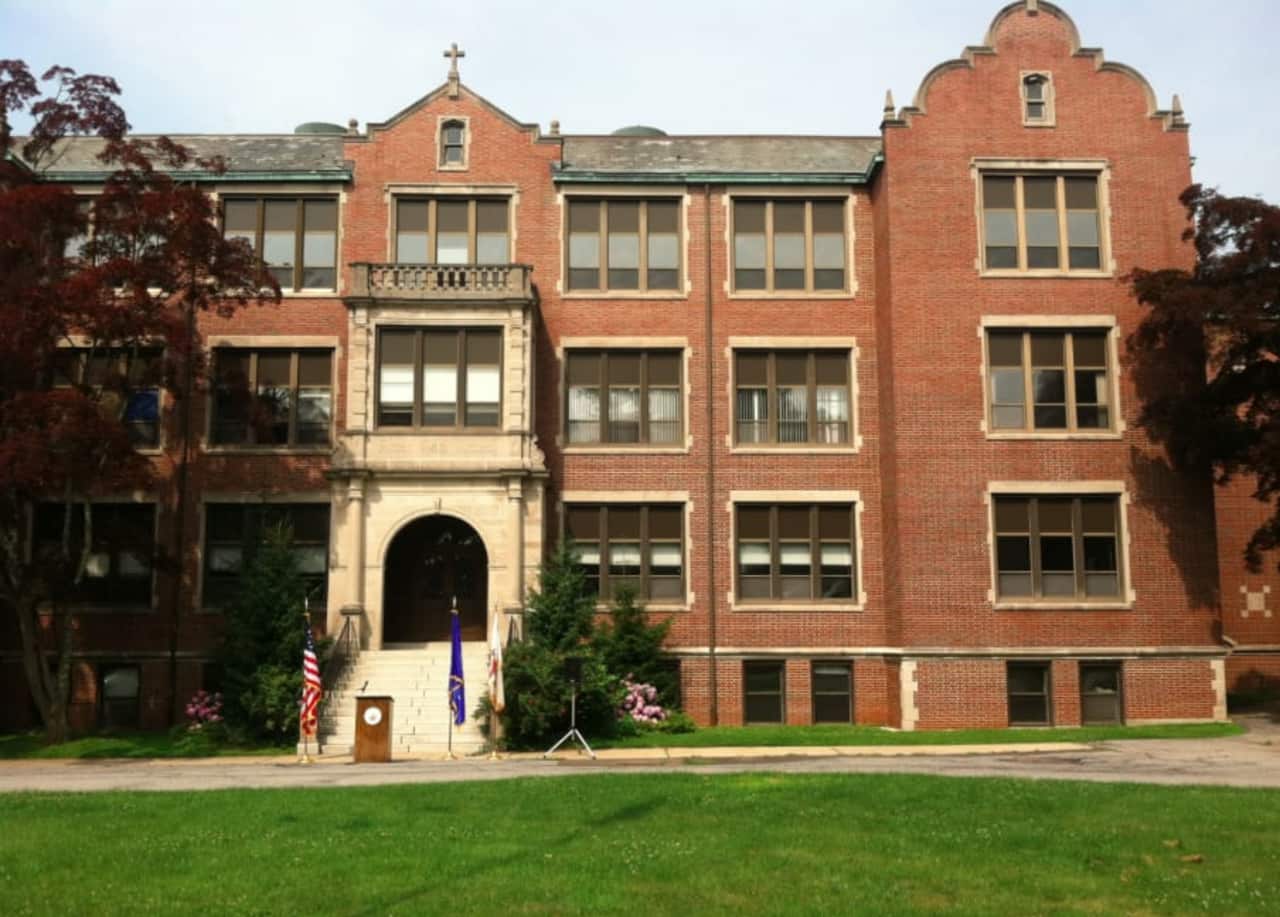 The former Sacred Heart Academy will temporarily be known as New School at 200 Strawberry Hill until a permanent name is decided, the Stamford Advocate reports.