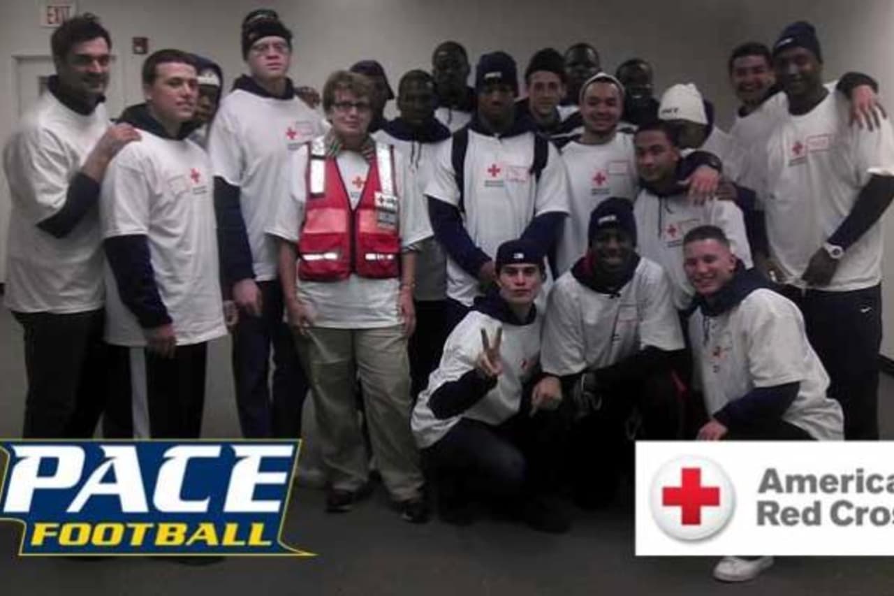 The Pace University football team volunteered at the Red Cross Warehouse in Jersey City, N.J. to help with Hurricane Sandy relief efforts.