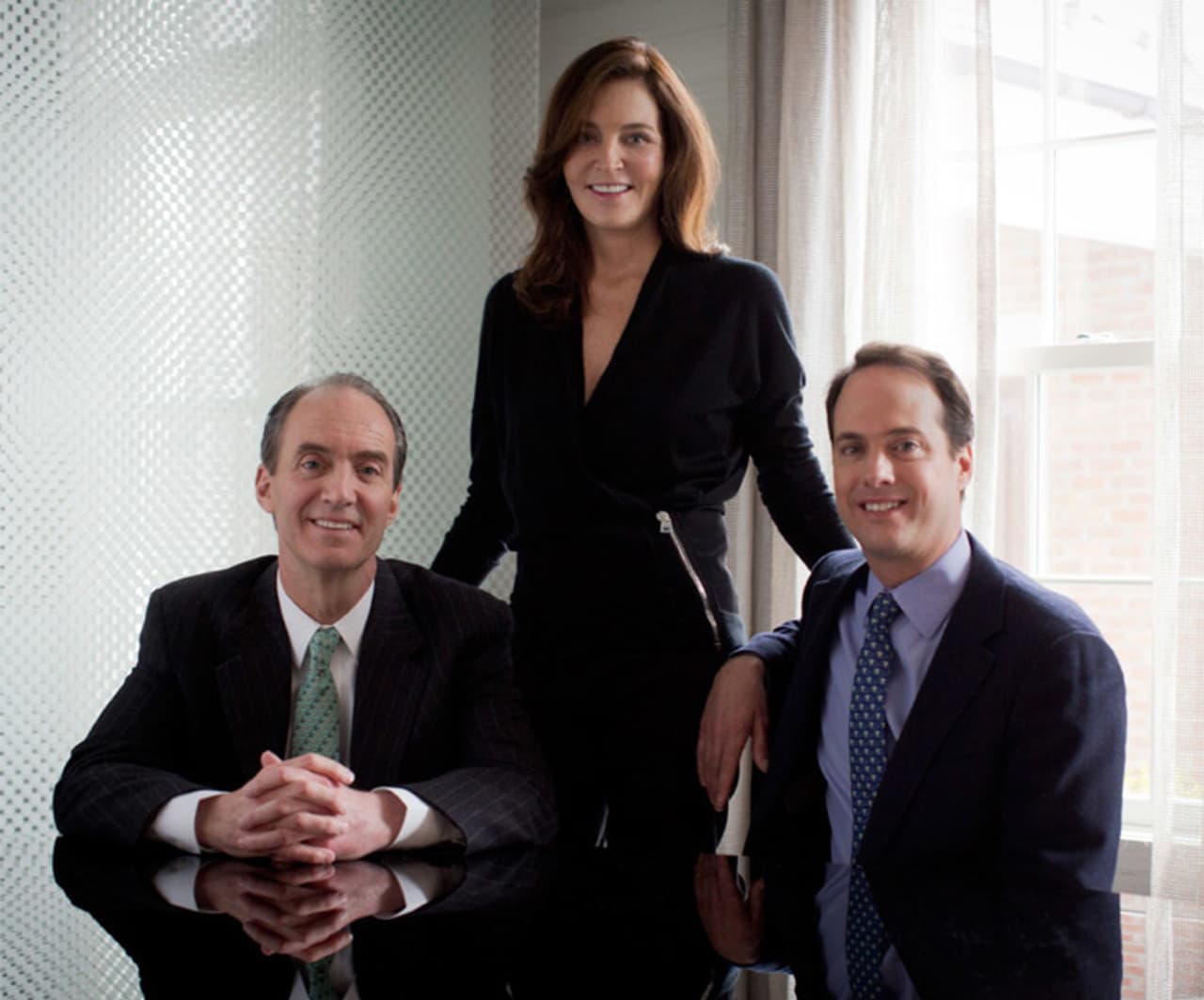 Left to right are Stephen Meyers, Nancy Seaman and Chris Meyers, the brother and sister leadership team for Houlihan Lawrence.  Brotherhood & Higley, New Canaan's oldest real estate brokerage, announced on Tuesday it would affiliate with HL.