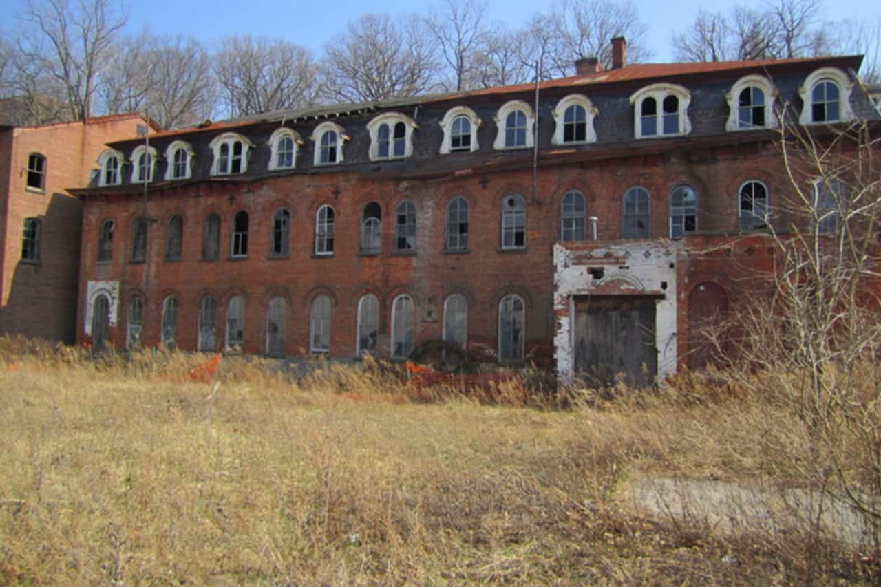 The abandoned Brandreth Pill Factory in Ossining is the source of a dispute between developers and the town.