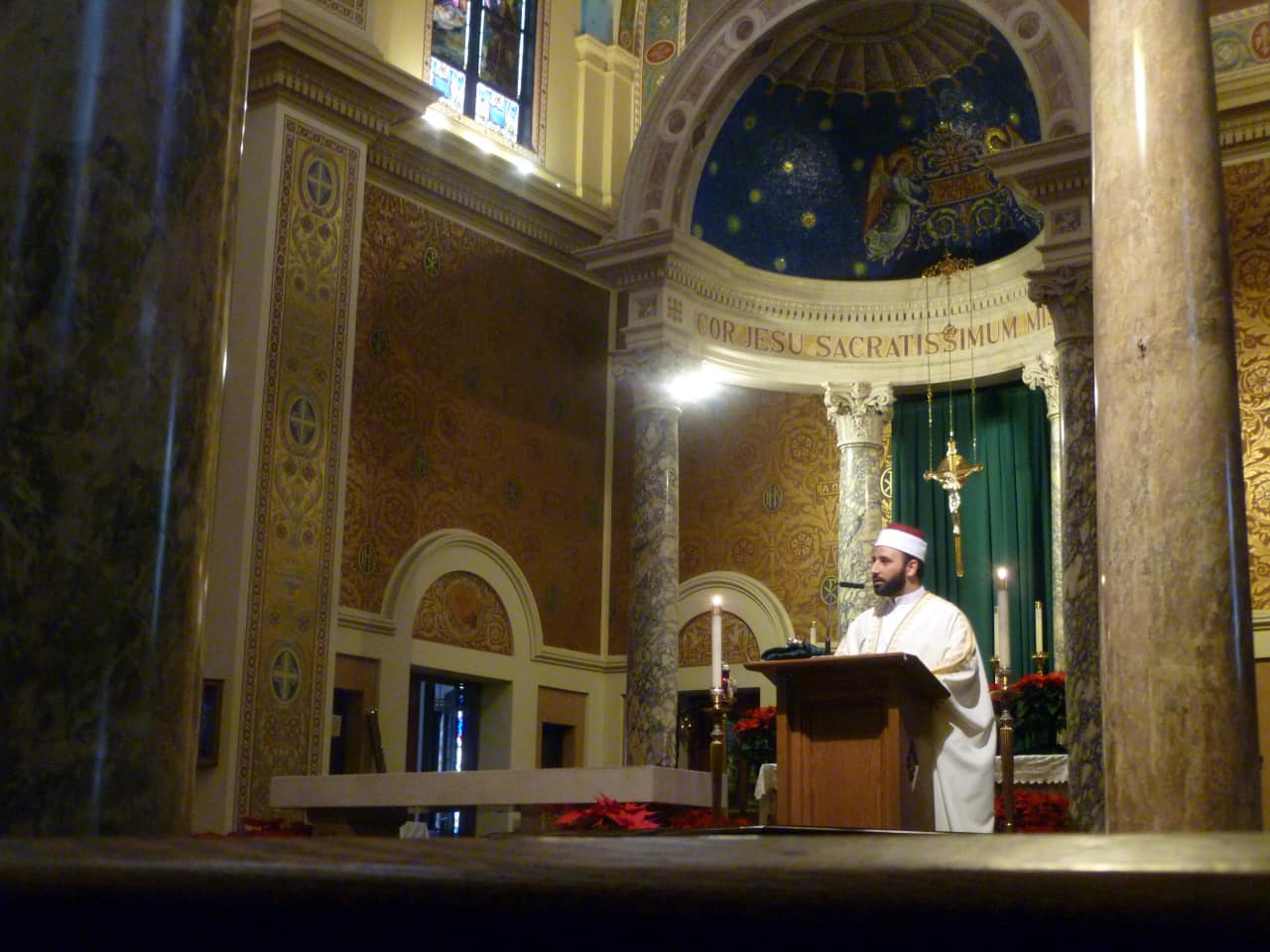 Shaikh Waleed Elbatrawish of the Imam Andalusia Islamic Center recites a prayer Sunday at the Interreligious Prayer Service at the Monastery Church of the Sacred Heart in Yonkers. 