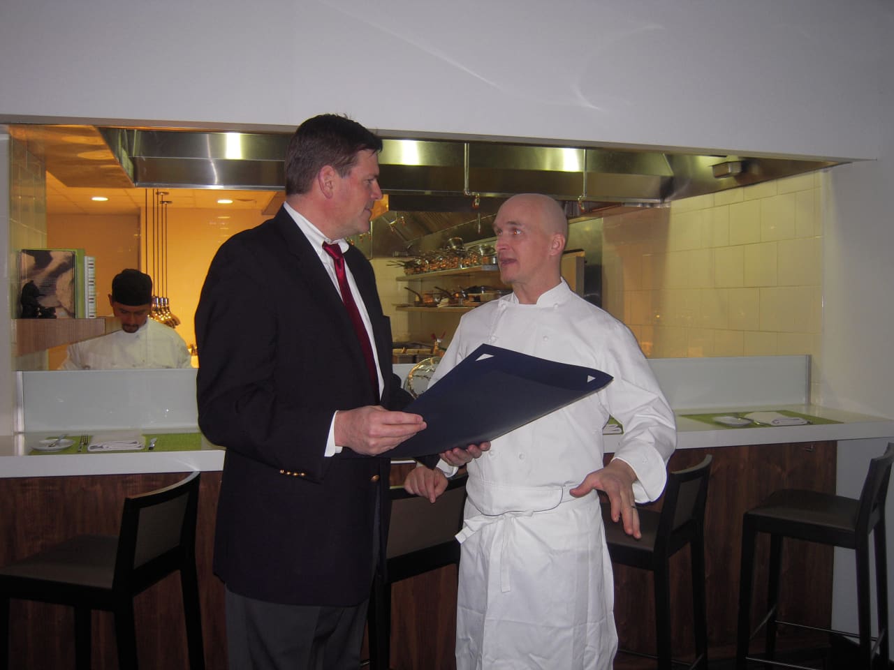 State Rep. Tom O'Dea, R-125, meets with Brian Lewis, owner and chef at Elm Restaurant in New Canaan, to celebrate his first anniversary in business. 