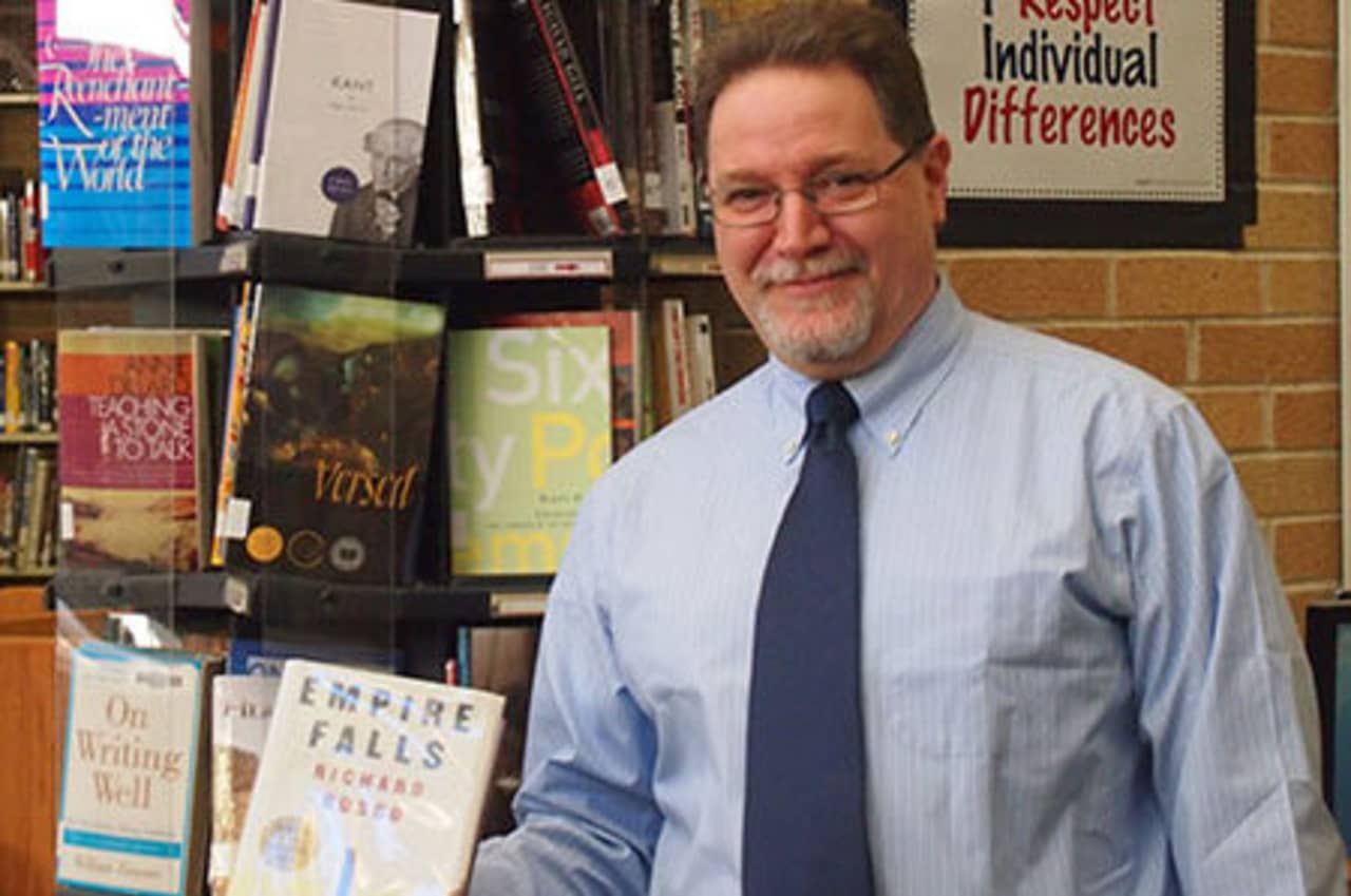 Harrison High School teacher Gary Glauber created a poem using words and phrases from Richard Russo's book "Empire Falls."
