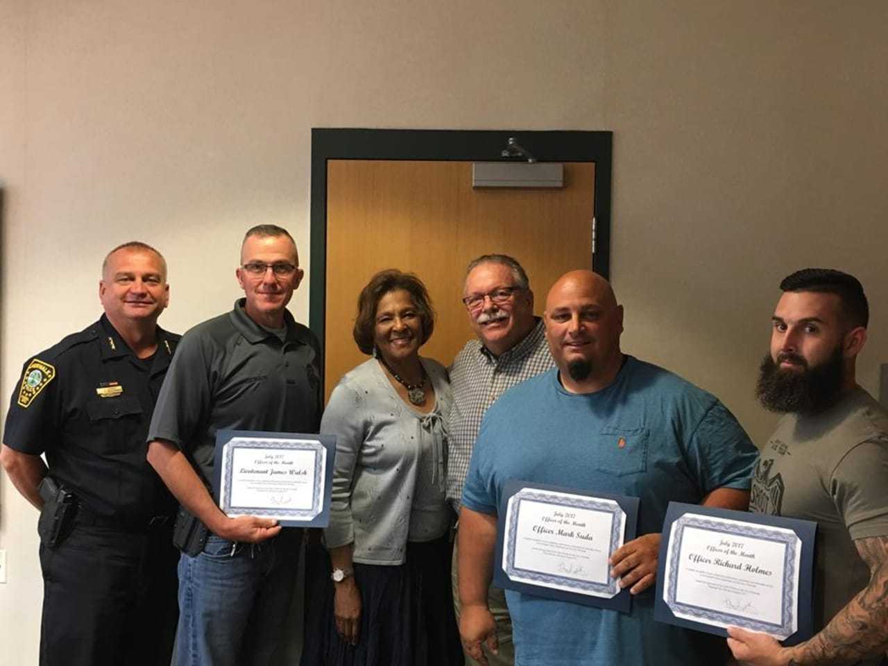 Chief Kulhawik, Lt. Walsh, Commissioner Collier-Clemmons, Commissioner Yost, Officer Suda and Officer Holmes