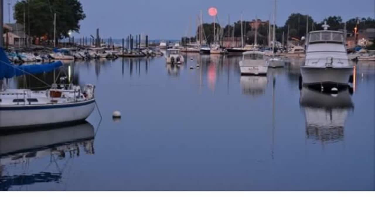 A rare strawberry moon rises over Harbor Island in Mamaroneck.