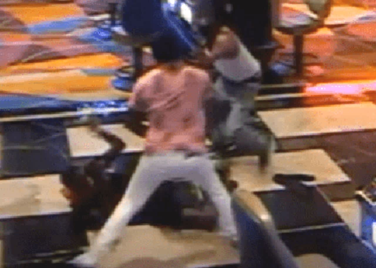 Surveillance image from brawl on Atlantic City Tropicana Casino floor.