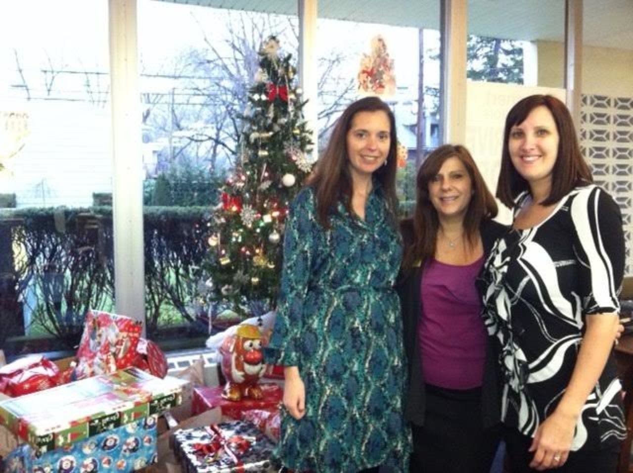 Nicole McQuillen, Susan Devine, and Laura Del Tufo help coordinate this year's toy drive in Fair Lawn.