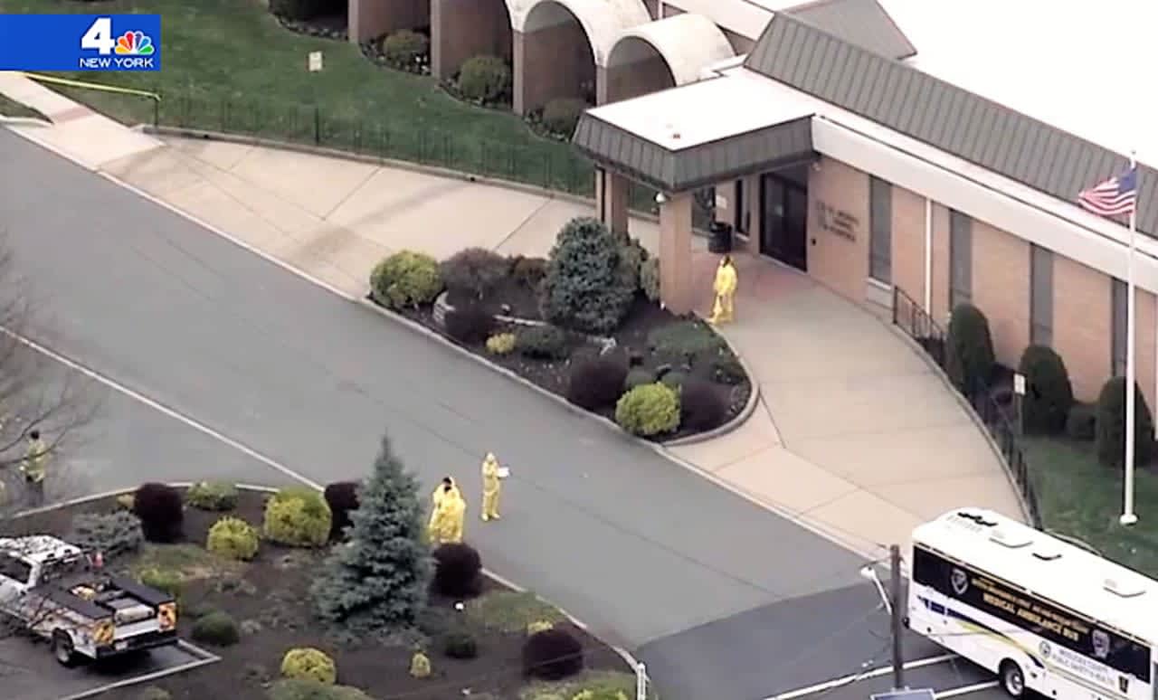NBC's Chopper 4 got an aerial shot of people in heavy protective gear outside St. Joseph’s Senior Home in Woodbridge.