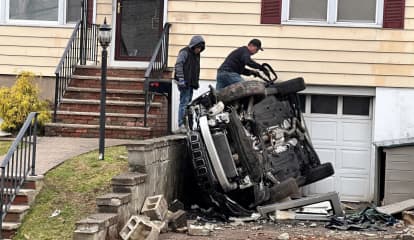 WILD ONE: Jeep Hits Three Homes, Rolls, Lands Sideways, Driver Survives: Hasbrouck Heights PD