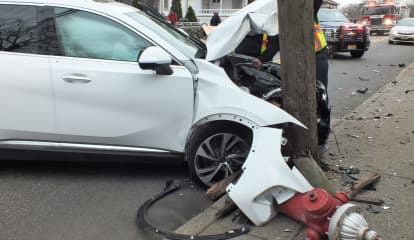 Driver, 86, OK After SUV Slams Into Hydrant, Pole In Ridgewood