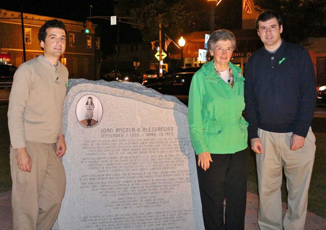 Rosemarie D'Alessandro with sons John and Michael, at Joan's sculpture and garden in Hillsdale.