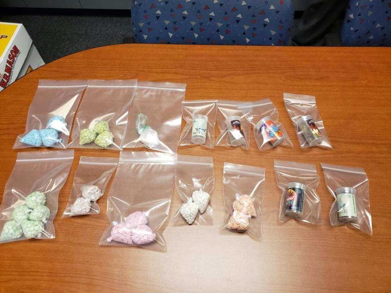 New York State Police troopers arrested a man with a host of drugs after a brief struggle.