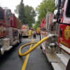 The blaze was knocked out shortly after 1:30 p.m. with assistance from over a dozen other fire crews.