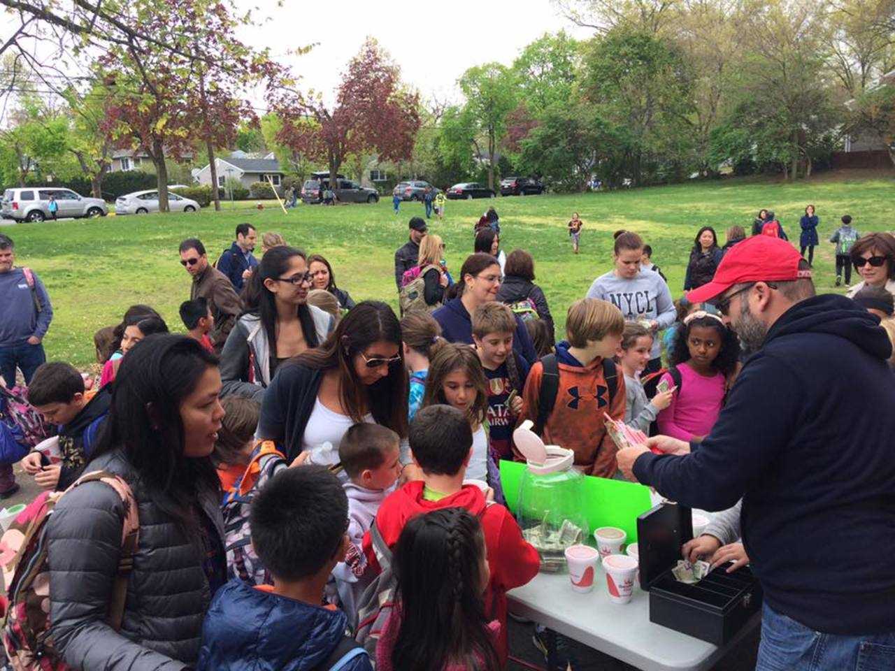 Parents and students from the Coleman School helped Girls on the Run raise $445 at its Friday smoothie sale for the Glen Rock Dog Park.